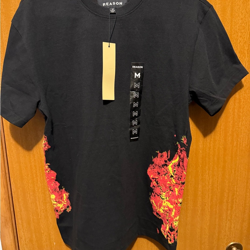 Reason Black Tee with Fiery Red and Yellow Accents